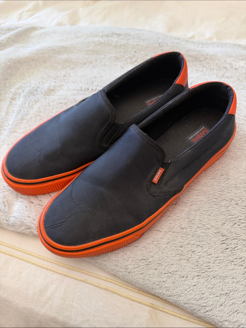 Swims Black and Orange Slip-On Sneakers with Elastic Panels
